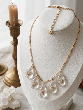 Bijou  multifaceted teardrop rhinestone floral burst gold chain necklace